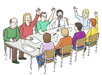Eine Gruppe Menschen heben ihre Hände und sitzen an einem Tisch.