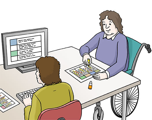 Zwei Personen arbeiten an einem Arbeitsplatz