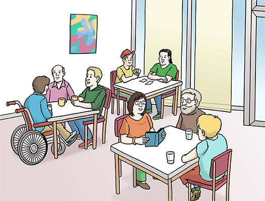 Menschen sitzen gesellig an Tischen