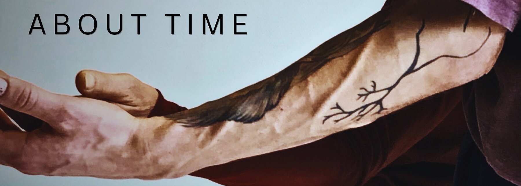 Arm mit Baumtattoo