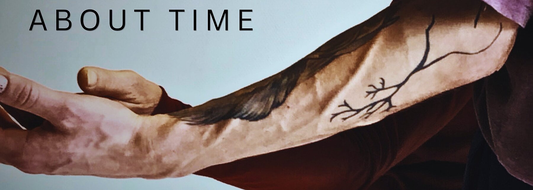 Arm mit Baumtattoo