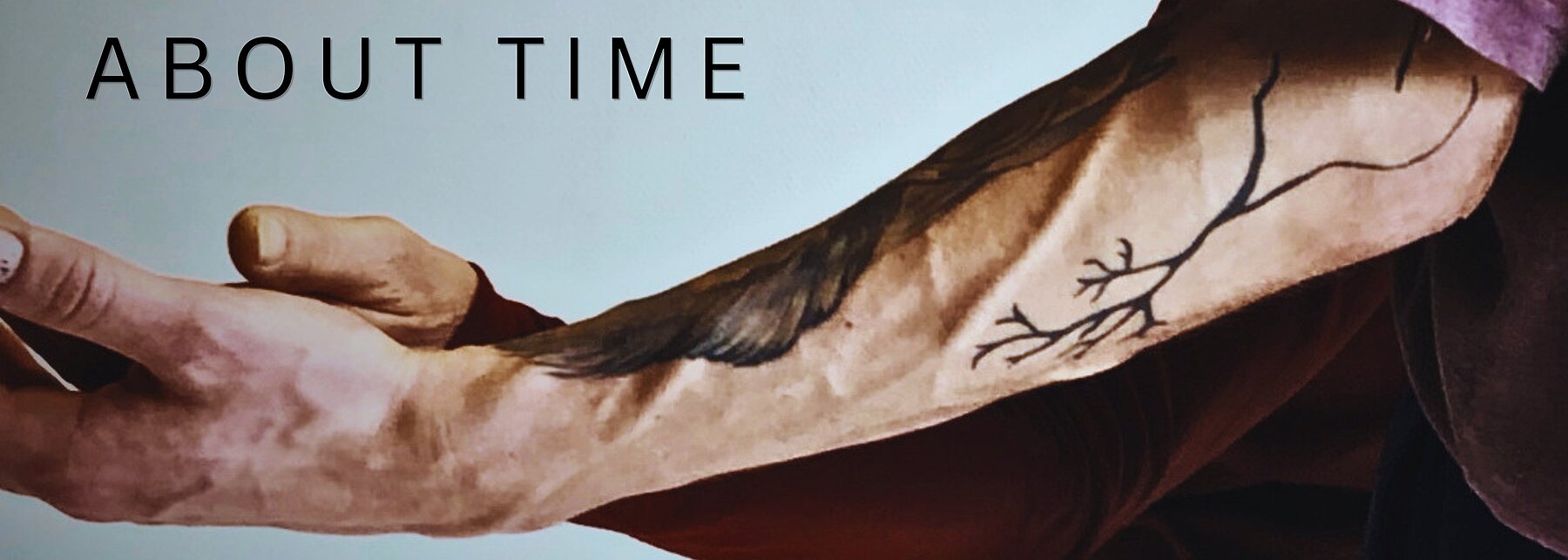 Arm mit Baumtattoo