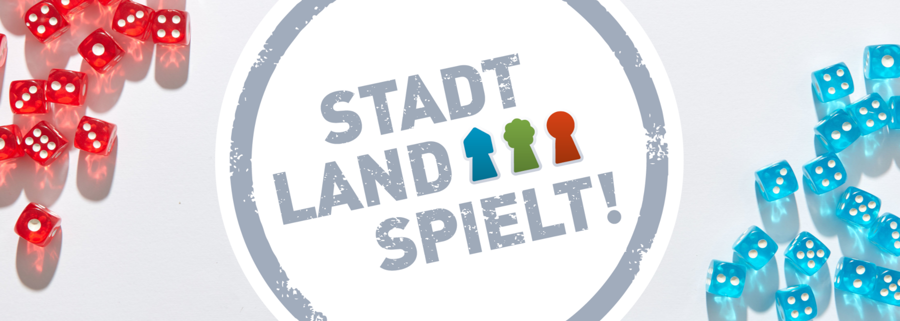 Logo von Stadt-Land-Spielt! und bunte Würfel.