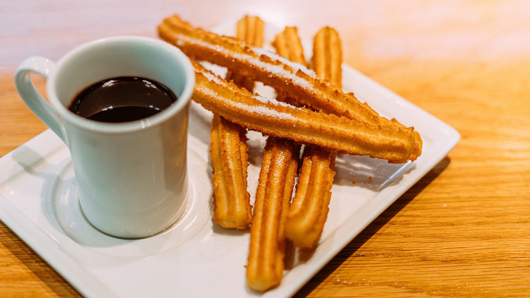 Tasse mit Churros