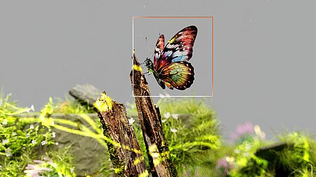 Abstraktes Bild mit einem Schmetterling in einer verpixelten Umgebung.